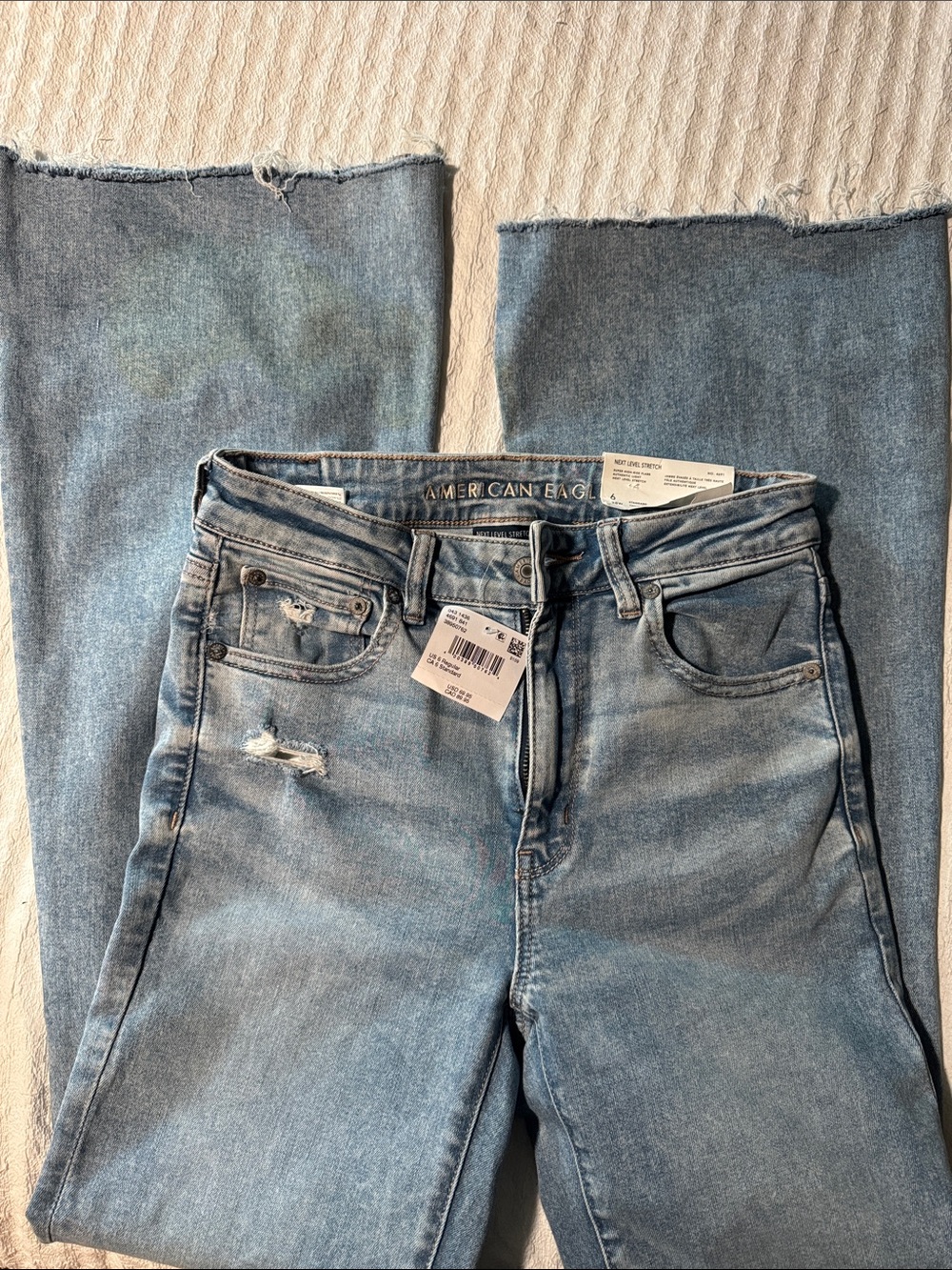 American Eagle Light Wash Distressed Super High Rise